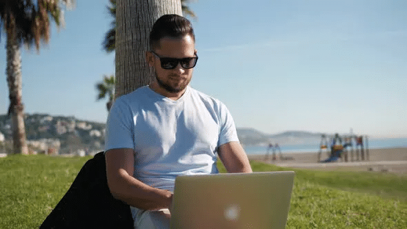 man working with laptop